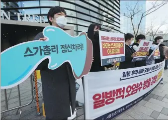  ??  ?? South Koreans make clear their health concerns over Japan’s wastewater decision in a protest outside the Japanese embassy in Seoul on Tuesday.