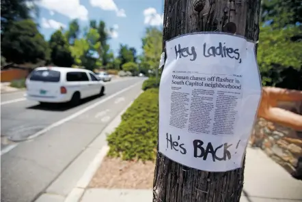  ?? LUIS SANCHEZ SATURNO/ THE NEW MEXICAN ?? A sign warning that ‘He’s Back’ was posted Tuesday on a utility pole on Don Gaspar Avenue. Women in the South Capitol area are holding a meeting Thursday to focus on security and defense strategies.