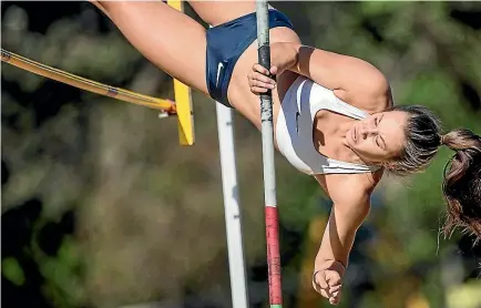  ??  ?? Up and over goes pole vaulter Olivia McTaggart at the Capital Classic athletics meet at Newtown Park in Wellington.