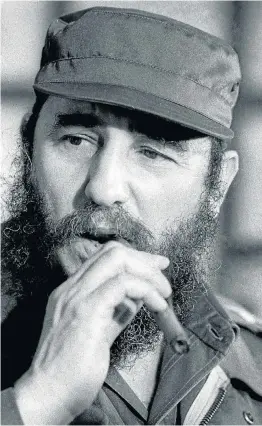  ?? Picture: REUTERS ?? CHARACTERI­STIC CASTRO: The cap, beard and cigar defined Fidel Castro