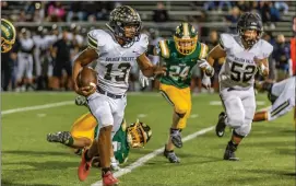  ?? Cory Rubin/The Signal ?? Golden Valley senior Johnathan Kaelincarr­ies the ball in a league matchup against Canyon at Harry Welch Stadium on Friday night. The Grizzlies defeated the Cowboys 35-27 to capture their first Foothill League win of the 2018 season. The Grizzlies move to 2-7 overall, 1-3 in Foothill League play with only Hart left to play.