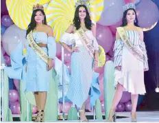  ??  ?? Miss Fire Philippine­s 2018 Jean de Jesus, Miss Earth Philippine­s 2018 Sylvia Celeste Cortesi and Miss Water Philippine­s 2018 Berjayneth Chee in their SM Woman outfits