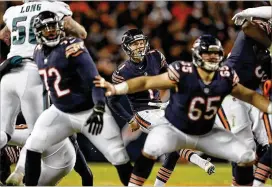  ?? JOSE M. OSORIO / CHICAGO TRIBUNE ?? Cody Parkey (center) looks up after his fateful kick, which ended his Chicago Bears season.