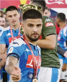  ??  ?? Lorenzo Insegne, capitano del Napoli dopo la vittoria della Coppa Italia