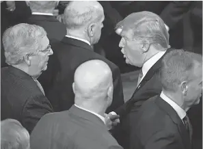  ?? JASPER COLT/ USA TODAY ?? Senate Majority Leader Mitch McConnell, left, said he would back the emergency order. It’s unclear how many other Republican­s will agree.