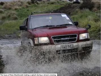  ??  ?? The Isuzu of Ross MacDonald making a splash during a stream crossing.