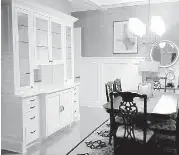  ?? Photo courtesy of Anthony Renard Remodeling ?? This dining room remodel features a new buffet, ceiling beams and paneling.