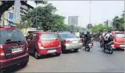  ?? BACHCHAN KUMAR ?? Haphazardl­y parked cars cover a part of the road and often disrupt traffic in the busy area.