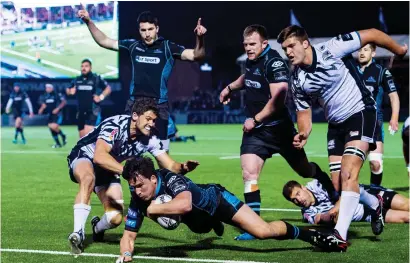  ?? Photograph: SNS ?? Sam Johnson scores a try against Zebre in Glasgow’s 45-10 victory