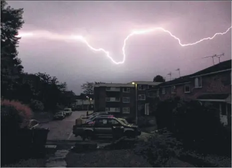  ?? Picture: Andy Clark ?? Lightning over Ashford