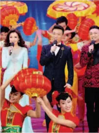  ??  ?? February 10, 2017: Dong (second from left) and other TV personalit­ies host the 2017 CCTV Lantern Festival Gala, a scaled- down version of the Spring Festival Gala, which features a number of exclusive songs, dances and skits. IC