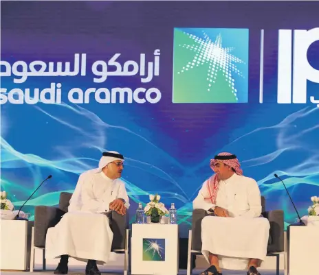  ?? Reuters ?? Amin Nasser, chief executive of Saudi Aramco, and Yasir Al Rumayyan, Saudi Aramco’s chairman, at yesterday’s IPO announceme­nt in Dhahran, Saudi Arabia