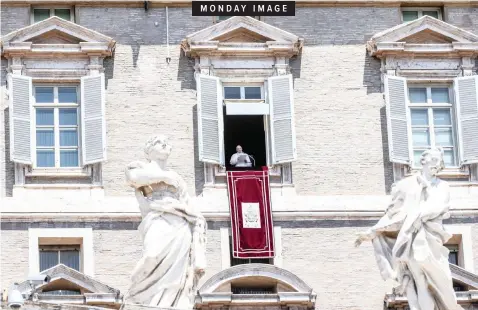  ??  ?? Pope Francis greets the faithful as he leads the Angelus Prayer from the window of his office overlookin­g Saint Peter’s Square at the Vatican yesterday. | EPA