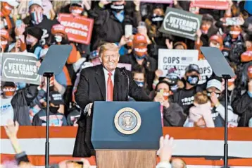  ?? JEFF SWENSEN/GETTY ?? With his campaign facing hard decisions on spending, President Trump has had to resort to holding more in-person rallies.