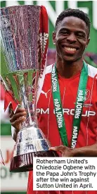  ?? ?? Rotherham United’s Chiedozie Ogbene with the Papa John’s Trophy after the win against Sutton United in April.