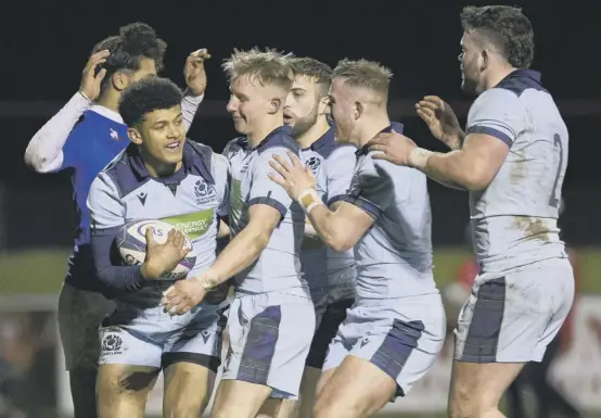  ??  ?? Scotland’s Jacob Henry celebrates his try during the U20 Six Nations match against France last year. There has been no age-grade rugby this season