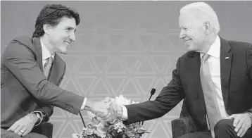  ?? ANDREW HARNIK AP ?? President Biden, during a recent trip to Canada, had hoped to persuade Prime Minister Justin Trudeau to lead a military interventi­on in Haiti, which Trudeau rejected.