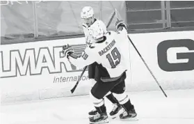  ?? MARY ALTAFFER | AP ?? Capitals left wing Jakub Vrana (13) celebrates after scoring a goal with Nicklas Backstrom during the third period Saturday against the New Jersey Devils.