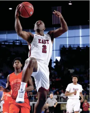  ??  ?? Memphis East’s Alex Lomax (2) goes up for a shot during the game against Blackman in the quarterfin­als of the TSSAA Boys State Basketball Tournament on Wednesday, March 14, 2018, at MTSU. HELEN COMER/DNJ