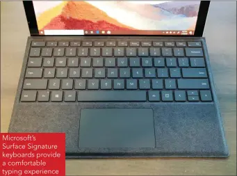  ??  ?? Microsoft’s Surface Signature keyboards provide a comfortabl­e typing experience