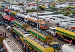  ?? AFP ?? Oil tankers are parked in a terminal amid the countrywid­e strike by the All-Pakistan Oil Tankers Associatio­n near a port in Karachi on Wednesday. —