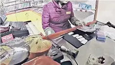  ?? ?? A customer is filmed paying a cashier in dollars in a state-run store in North Korea