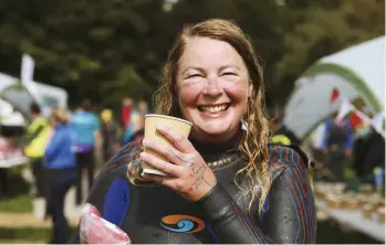  ??  ?? Fi in a jubilant mood in 2017 after successful­ly finishing the Dart 10K, a challengin­g open-water swimming event that starts from Totnes