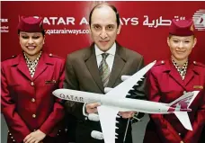  ??  ?? Female focus: Akbar Al Baker with Diana Ross at a New York gala, left, and posing with air crew