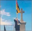  ??  ?? DJ MacDougall pipes ‘The Battle’s O’er’ to mark VE Day; above, Donny Reynolds of Seil raises the standard to mark VE Day in a new film; below left, John Alexander, chairman of the Easedale Legion Scotland branch.