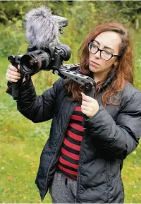  ??  ?? ●● Natalie Kennedy at work and, left, a scene from her last film Down and Out