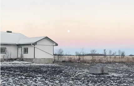  ??  ?? I snapped this photo of the Full Cold Moon - just above the Belt of Venus - before sunrise on Dec. 23. It was a chilly morning walk from the barn in Bainsville, Ont.