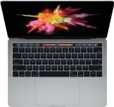  ??  ?? Das Macbook Pro zeigt mit der Touch Bar viel Innovative­s, ist dafür aber auch sehr kostspieli­g.