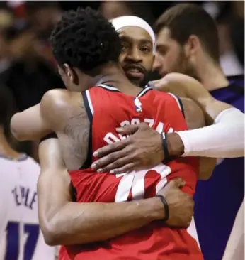  ?? RICHARD LAUTENS/TORONTO STAR ?? Former Raptors star Vince Carter got a warm reception from DeMar DeRozan and the Air Canada Centre crowd in perhaps his final visit at age 40. Asked about his future, the former Vinsanity said: “I still don’t know.”