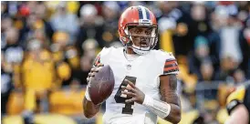  ?? MATT DURISKO / AP ?? Cleveland general manager Andrew Berry indicated Tuesday the team may restructur­e the five-year, $230 million deal it used to entice quarterbac­k Deshaun Watson (pictured) to agree to a trade from Houston to the Browns one year ago.