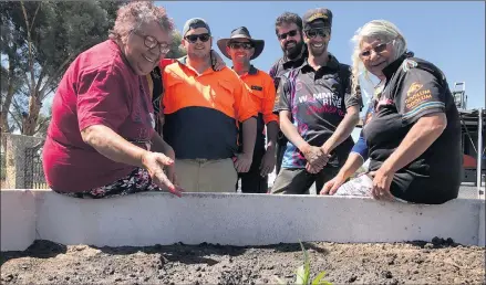  ??  ?? ENHANCING HEALTH OUTCOMES: Aunty Hazel Mcdonald, left, and Aunty Regina Hood with Goolum Goolum Aboriginal Co-operative staff, from left, Kyle Harrison, Sarren Branson, Jeremy Newell and Fabian Tregonning, at Horsham Showground’s community garden....