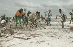  ??  ?? A salt lake in Dallol, Ethiopia, is the main source of income for locals.