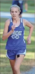  ?? Tommy Romanach / RN-T ?? Armuchee’s Chloe Purdy takes a solid lead in the girls’ race.