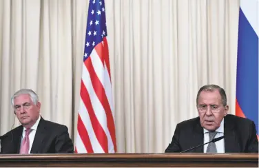  ?? Alexander Nemenov / AFP / Getty Images ?? Secretary of State Rex Tillerson (left) and Russian Foreign Minister Sergey Lavrov talk to the media.