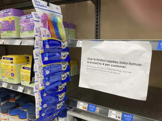  ?? David Zalubowski, The Associated Press ?? A sign telling consumers of limits on the purchase of baby formula hangs on the edge of an empty shelf for the product at a King Soopers grocery store in southeast Denver.