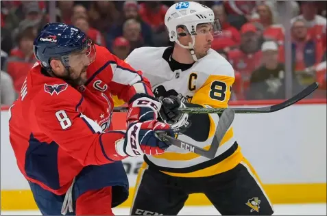  ?? File photo ?? Thanks in part to the longevity of superstars Alex Ovechkin, left, and Sidney Crosby, right, the NHL is in a healthy place financiall­y after the pandemic impactnedd­the league’s bottom line.