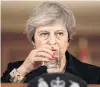  ?? PHOTO: GETTY IMAGES ?? Britain’s Prime Minister Theresa May drinks at a press conference inside 10 Downing Street, London, England.