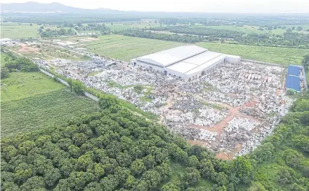  ?? ROYAL THAI POLICE ?? An electronic waste-recycling factory and its compound in Chachoengs­ao’s Plaeng Yao district are shown on May 22, part of the Eastern Economic Corridor (EEC). Local communitie­s complain of hazardous waste being smuggled in from abroad to be burnt and destroyed there.