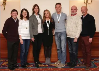  ??  ?? National medal winners with the Wicklow Athletics team, from left; Bill Porter, Sarah Baryga, Suzanne Foot and Catherine O’Connor, national over-35 team masters bronze; Gary Condon, national over-45 masters gold, Cyril Smyth and Dermot Brennan.