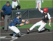  ?? GENE WALSH — DIGITAL FIRST MEDIA ?? La Salle catcher Andrew Cossetti tags out Archbishop Carroll’s Dan Crossan while trying to steal home Monday.