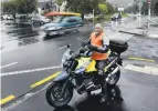  ?? PHOTO: ODT FILES ?? Safety first . . . Dunedin motorcycli­st Brian O’Neill at the intersecti­on of Duke St and Cumberland St last year.