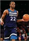  ?? ABBIE PARR / GETTY IMAGES ?? Minnesota’s Andrew Wiggins will make more than $25 million next season but could end up being traded.