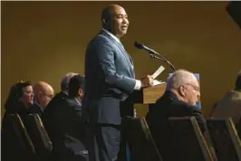  ?? MATT ROURKE/AP ?? Democratic National Committee chair Jaime Harrison speaks Saturday at the DNC’s Winter Meeting in Philadelph­ia, where a new primary lineup for 2024 was approved.