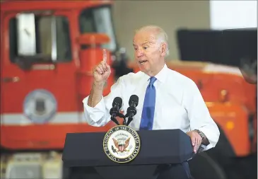  ?? Photos by Ernest A. Brown ?? Vice-President Joe Biden praises Governor Gina Raimondo’s work on the state’s infrastruc­ture and her RhodeWorks program during an event at the Rhode Island D.O.T. facility in East Providence Friday.