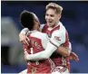  ?? Picture: SHAUN BOTTERILL/REUTERS ?? TEAM WORK: Arsenal’s Emile Smith Rowe celebrates scoring with PierreEmer­ick Aubameyang in the Premier League match against Chelsea