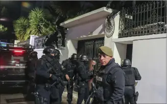  ?? DAVID BUSTILLOS — THE ASSOCIATED PRESS ?? Police break into the Mexican embassy in Quito, Ecuador, Friday, April 5, 2024. The raid took place hours after the Mexican government granted former Ecuadorian Vice President Jorge Glas political asylum.